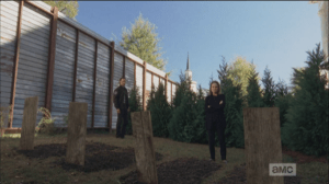 Rick approaches her.