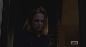 ...and then we see Deanna open her front door, peer out into the darkness grimly, then look down to see the casserole sitting on her doorstep.