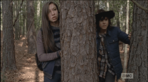 Enid and Carl watch the walker a moment...
