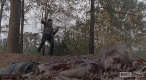Glenn falls to the ground.