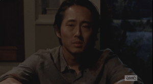 Glenn looks sorrowfully at his listener. 