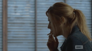 Jessie's sneaking a smoke...I am sure girlfriend needs something in these times.  If I were married to McBeaty, raising two sons in a zombie apocalypse, I would def be raiding the storeroom for liquor and smokes on a regular basis.