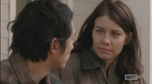 Maggie looks at Glenn's troubled face. 