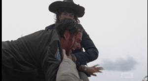 Carl screams for his father, tries to pull Rick off, and Rick, blind with rage, shoves his son off...at least he didn't backhand him, McBeaty, you dick!