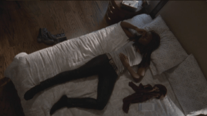 ...and we see Michonne lying in bed, trying to get another moment of sleep.