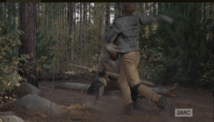 Morgan ducks low to evade another wild swing from the blond wboy's scythe, and the young man's balance is thrown off again...a swift strike from Morgan's staff into the young man's lower spine sends him toppling forward into the dirt.
