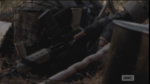 Morgan reaches down for his staff, only to be stopped by the sound of the safetly being released on the young man's gun.