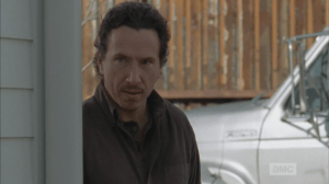Nicholas Lurker watches Glenn, hatred in his eyes...he surely has his handgun on him.