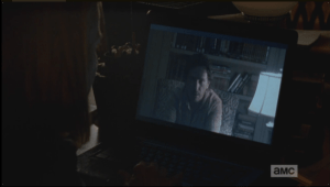 ...and we see Nicholas react silently, angrily as Deanna lays down the law: No guns, no going outside the wall...same goes for Glenn, until they get to the bottom of this.