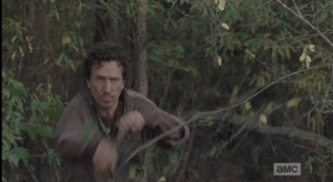 Nicholas rushes forward from his cowardly hiding spot in the bushes. (Nicholas! You dastardly bastard!)