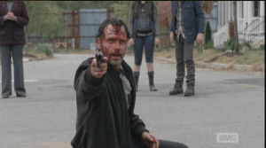 Rick's looking all Bloody Romeo and shit, looks around, laughs, shaking his head.