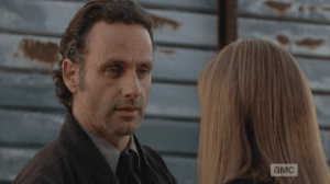 Rick looks at Deanna.