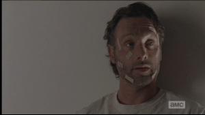 Rick looks around at the others in the room.