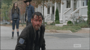 Rick looks at Deanna, says, 