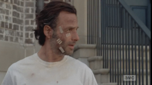 Rick steps out of juvie, blinking in the sunlight...