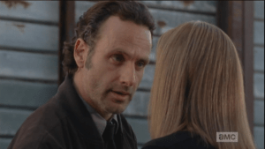 Rick Grimes, undaunted, tries to school Deanna in the ways of the new world order.