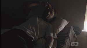 Shielding his eyes, caught unawares, Rick looks up at her.