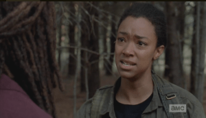 Sasha looks miserably at Michonne.