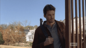 As he closes the gate, Spencer's look is like,