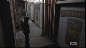 As they stand in front of the three trailers, Aaron happily remarks that even though they may have lost track of the man they were tailing, finding trailers full of canned goods is a pretty great find...Daryl agrees, squats down to pull open one of the trailer doors...the sliding door seems to set off some kind of mechanism, and all at once, all three doors slide open, and what they reveal inside is not quite the bounty the two men were looking for.