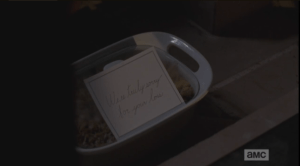 There is a note leaned up on the lid of the casserole,
