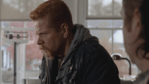 ...then looks away again. As Rosita and Eugene watch, Abraham seems to really struggle with saying the words: