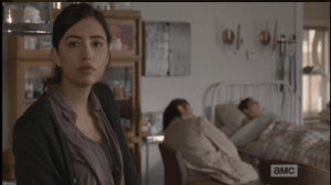 ...and stops short when he sees Eugene's dozing form, slumped in one of the visitor's chairs beside Tara's bed.