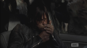 Daryl then lights his smoke, inhales.