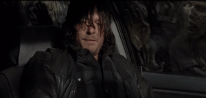 Daryl looks towards Aaron, then slightly away as he marvels,