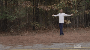 Gabriel opens his arms and calls out,
