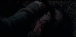 Glenn cocks the pistol, points it into the center of Nicholas's forehead, as Nicholas really starts to cry and beg.