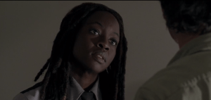 Michonne looks up at Rick, looking like The Most Beautiful Wise One (and you know that's a Deadie, and you know it goes to Michonne/Danai Gurira! <3).