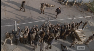 As the walkers rush the fence,  Aaron, Daryl, and Morgan take a moment to process the fact that they just escaped, against all odds. They made it!
