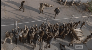 As the walkers rush the fence, Aaron, Daryl, and Morgan take a moment to process the fact that they just escaped, against all odds. They made it!