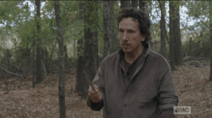 Nicholas pulls out his knife as the walker approaches, but seems to lack confidence in his hand to hand walker takedown skills...