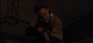 ...because Sasha's been pushed too far, she's got her #killinface on, and she's standing over Gabriel, pointing her rifle down at him, ready to defile another chapel with blood and guts!