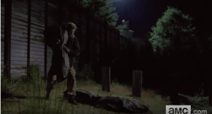 As we see Abraham heft a shrouded body to the ground for burial, A seems Carter's voice is echoing the murmur of dissent that is catching fire in Alexandria regarding the Ricktatorship.