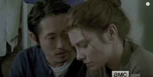 We see Glenn, leaning in towards Maggie, saying softly, 