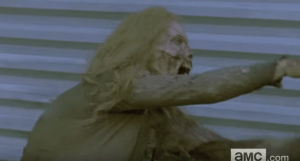 We see this walker rush forward as a man, off camera, cries, 