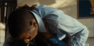 The walker presses forward, pinning Tobias down, in its undead singular purpose...