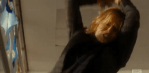 ...the walker, however, keeps getting up and going back for Tobias, still on the floor...it is relentless, savage, and Madison must keep hitting it, finally bringing the canister down hard and heavy on Artie Walker's head, with all her might.