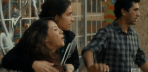 As the streets begin to erupt into violence, Travis, Liza and Chris have nowhere to run.