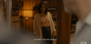...as his wife commands him to let them inside, and close the door.