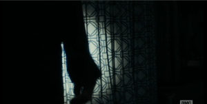 ...followed by a louder scratching sound against the sliding glass doors.