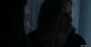 Alicia looks over towards her mom fearfully.