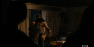 Dawson B. Infected rushes Travis, trying to bite at him, as Liza and Chris scream and Travis tries to push him back...