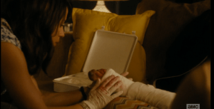 Travis processes this, then looks around at everyone before leaving the room, himself. Liza returns to tending Griselda's foot, which is looking pretty messed up.
