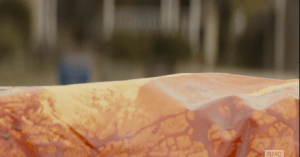 The pass the sad remains of the Cruz's bloodied bounce house.