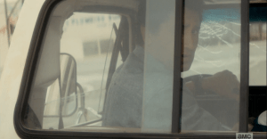 Travis looks back to see that Madison has turned and driving towards Patrick, having called out his name, to no avail.