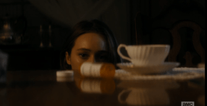 And as she rises to leave, she sees a disturbing sight on the table in front of her...an empty bottle of prescription pills, next to an elegant tea cup and saucer.